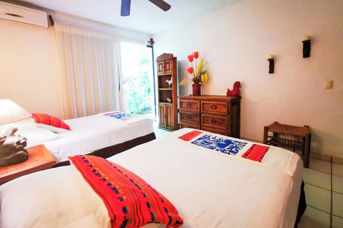 Imagen de la habitación del Hotel Cozy stay Tropical Vibes near Beach. Foto 5