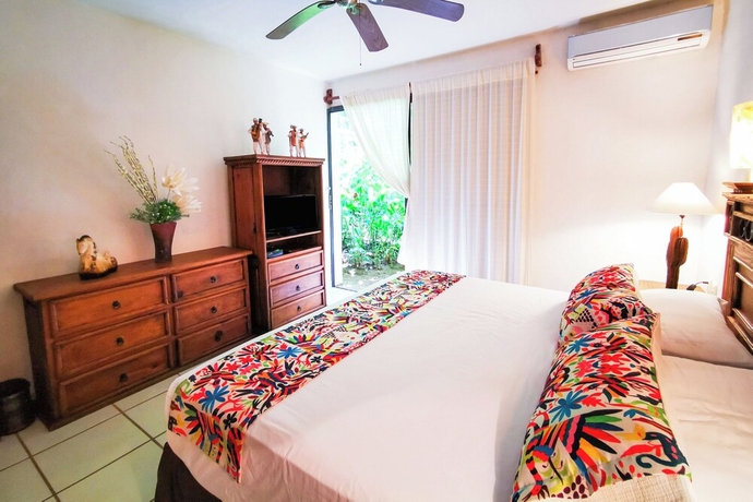 Imagen de la habitación del Hotel Cozy stay Tropical Vibes near Beach. Foto 8