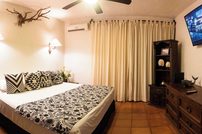 Imagen de la habitación del Hotel Cozy stay Tropical Vibes near Beach. Foto 15