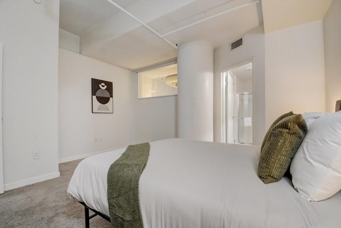 Imagen de la habitación del Hotel CozySuites The Block Skybridge Access. Foto 2