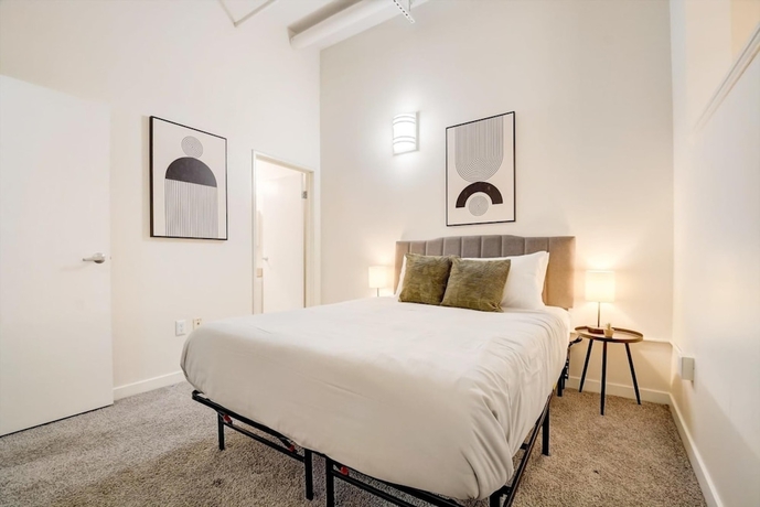 Imagen de la habitación del Hotel CozySuites The Block Skybridge Access. Foto 9