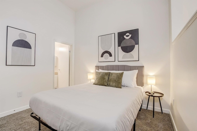 Imagen de la habitación del Hotel CozySuites The Block Skybridge Access. Foto 14