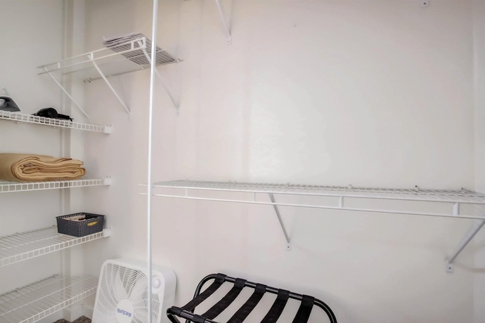 Imagen de la habitación del Hotel CozySuites The Block Skybridge Access. Foto 16