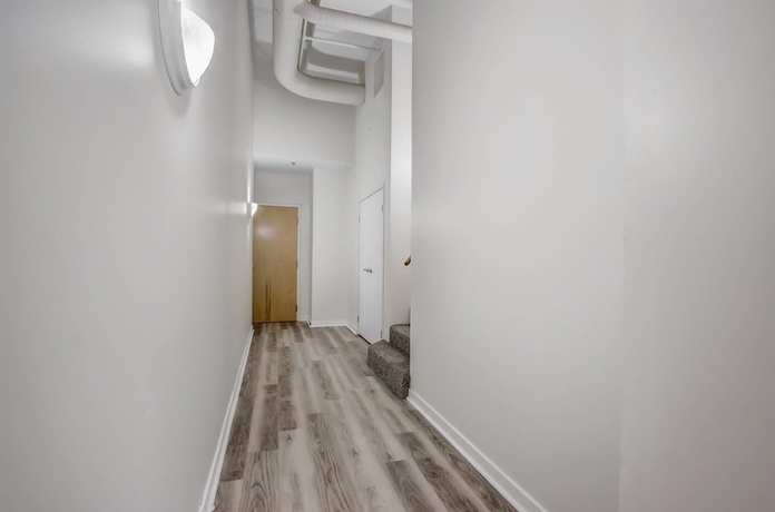 Imagen de la habitación del Hotel CozySuites The Block Skybridge Access. Foto 18