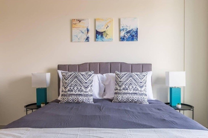 Imagen de la habitación del Hotel CozySuites at Nulu. Foto 2
