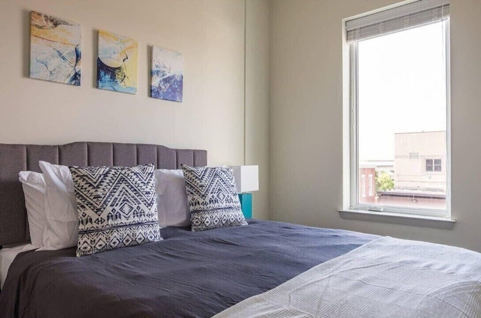 Imagen de la habitación del Hotel CozySuites at Nulu. Foto 15