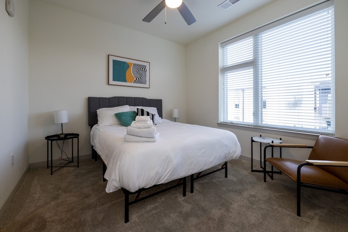 Imagen de la habitación del Hotel CozySuites at Nulu. Foto 16
