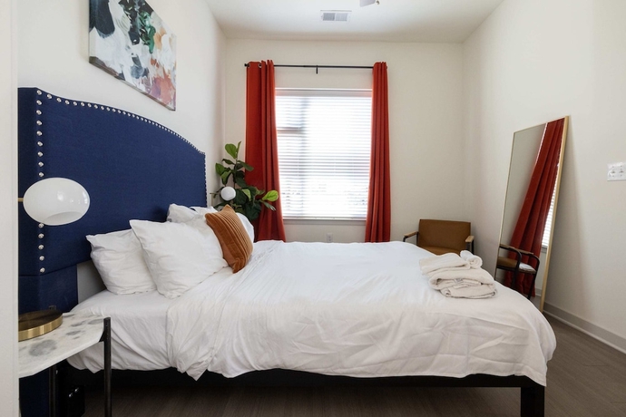 Imagen de la habitación del Hotel CozySuites at Nulu. Foto 18