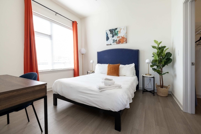 Imagen de la habitación del Hotel CozySuites at Nulu. Foto 19