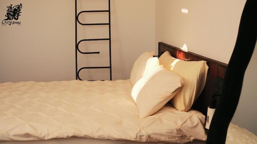 Imagen de la habitación del Hotel Cozyhome. Foto 2
