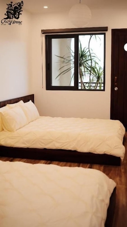 Imagen de la habitación del Hotel Cozyhome. Foto 6