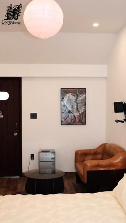 Imagen de la habitación del Hotel Cozyhome. Foto 11