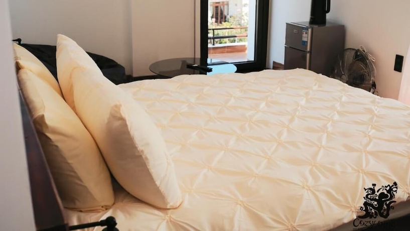 Imagen de la habitación del Hotel Cozyhome. Foto 13