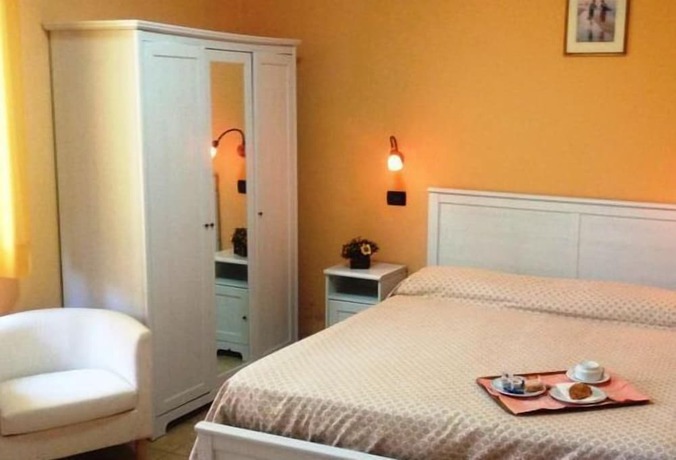 Imagen de la habitación del Hotel Cozza. Foto 13