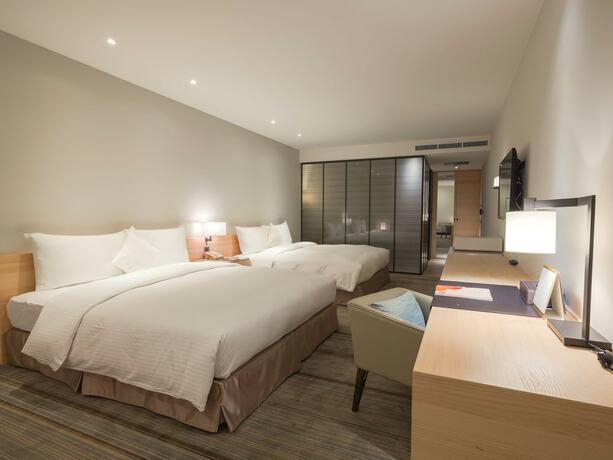 Imagen de la habitación del Hotel Cozzi Zhongshan Kaohsiung. Foto 12