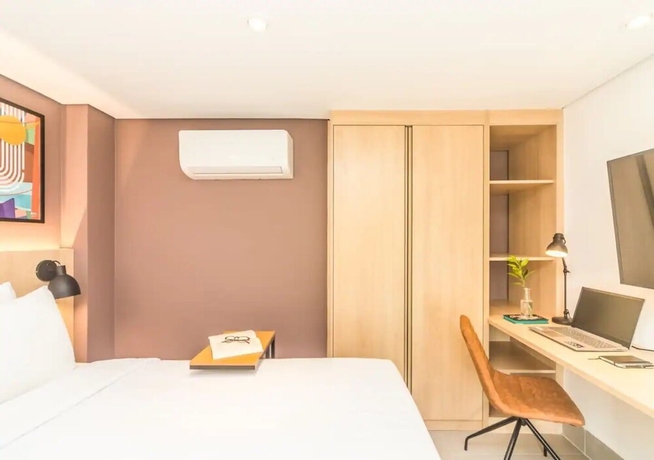 Imagen de la habitación del Hotel Cozzy Su&iacute;tes Para&iacute;so. Foto 11