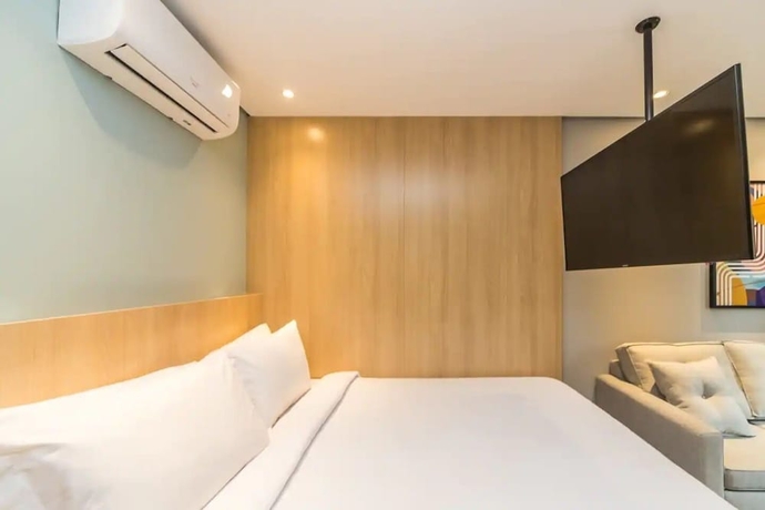 Imagen de la habitación del Hotel Cozzy Su&iacute;tes Para&iacute;so. Foto 12