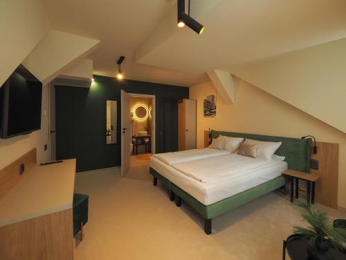 Imagen de la habitación del Hotel Craft Inn - Boutique. Foto 12