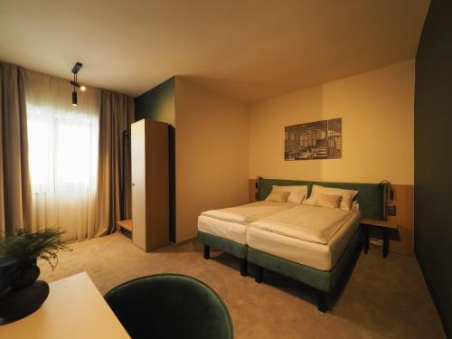 Imagen de la habitación del Hotel Craft Inn - Boutique. Foto 13