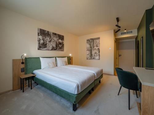 Imagen de la habitación del Hotel Craft Inn - Boutique. Foto 19