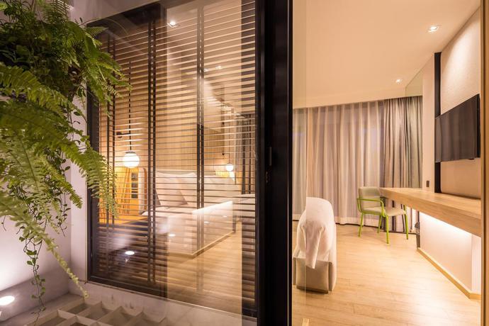 Imagen de la habitación del Hotel Craftsman Bangkok. Foto 7