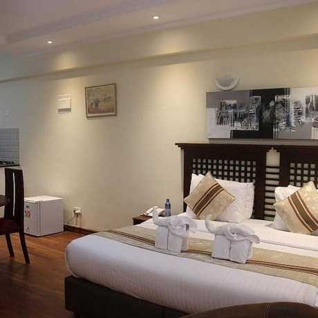 Imagen de la habitación del Hotel Cranes Suites. Foto 7