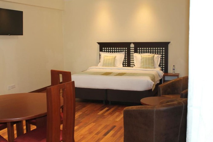 Imagen de la habitación del Hotel Cranes Suites. Foto 16