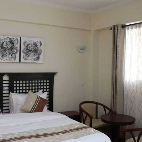 Imagen de la habitación del Hotel Cranes Suites. Foto 17