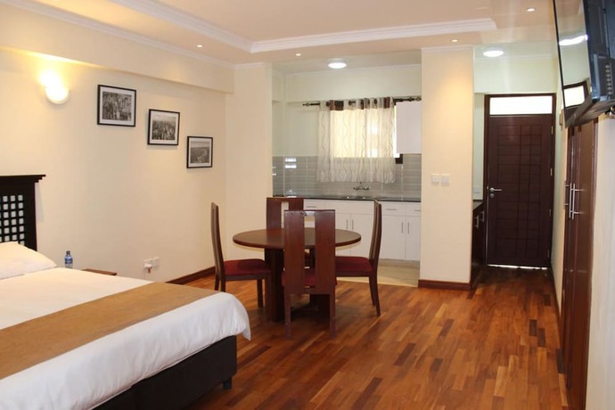 Imagen de la habitación del Hotel Cranes Suites. Foto 19