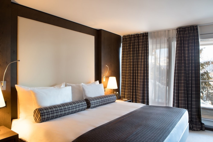 Imagen de la habitación del Hotel Crans Ambassador. Foto 14