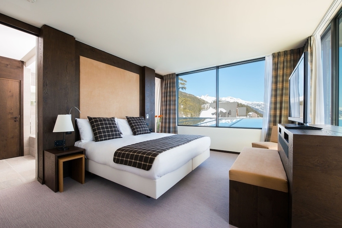 Imagen de la habitación del Hotel Crans Ambassador. Foto 17