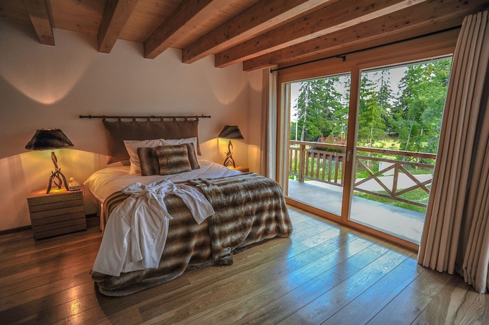 Imagen de la habitación del Hotel Crans Luxury Lodges. Foto 2