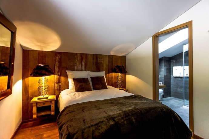 Imagen de la habitación del Hotel Crans Luxury Lodges. Foto 4