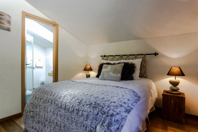 Imagen de la habitación del Hotel Crans Luxury Lodges. Foto 7