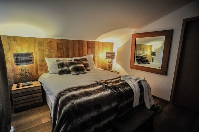 Imagen de la habitación del Hotel Crans Luxury Lodges. Foto 8