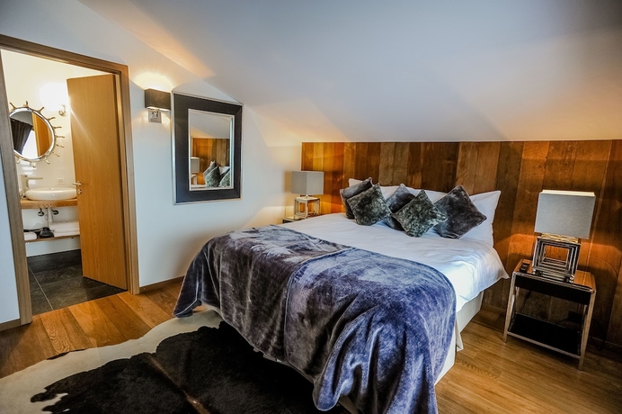 Imagen de la habitación del Hotel Crans Luxury Lodges. Foto 10