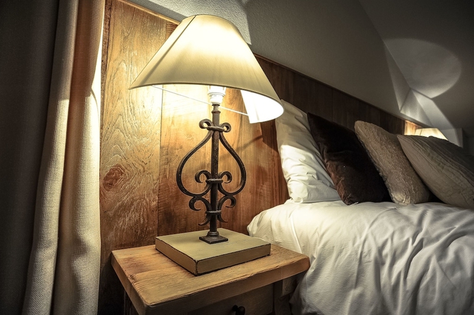 Imagen de la habitación del Hotel Crans Luxury Lodges. Foto 11
