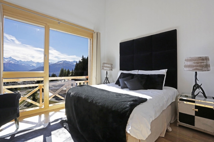 Imagen de la habitación del Hotel Crans Luxury Lodges. Foto 13