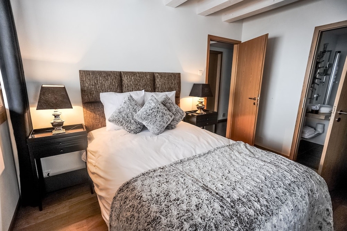 Imagen de la habitación del Hotel Crans Luxury Lodges. Foto 18
