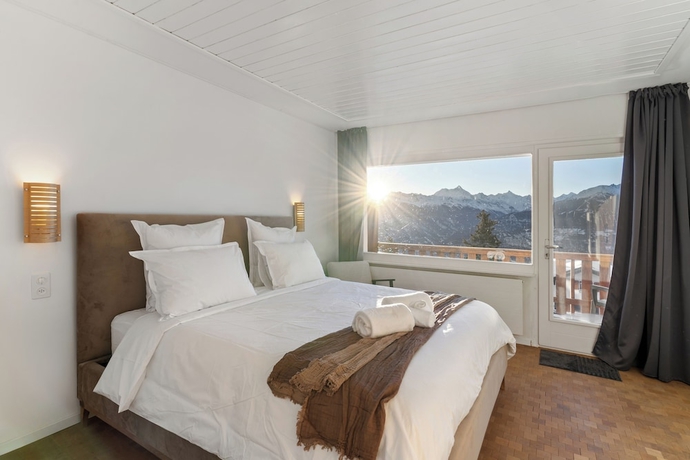 Imagen de la habitación del Hotel Crans Montana Suites. Foto 14