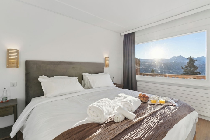 Imagen de la habitación del Hotel Crans Montana Suites. Foto 15