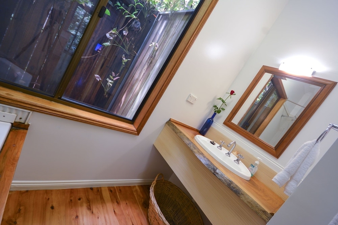 Imagen de la habitación del Hotel Crater Lakes Rainforest Cottages. Foto 17