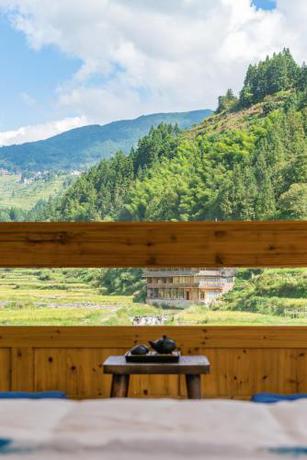 Imagen de la habitación del Hotel Creekside Inn, Liping. Foto 5