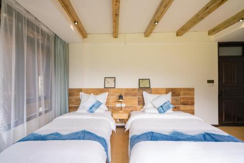 Imagen de la habitación del Hotel Creekside Inn, Liping. Foto 8