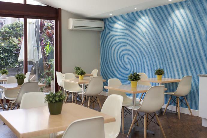 Imagen del bar/restaurante del Hotel Cremorne Point Manor. Foto 2