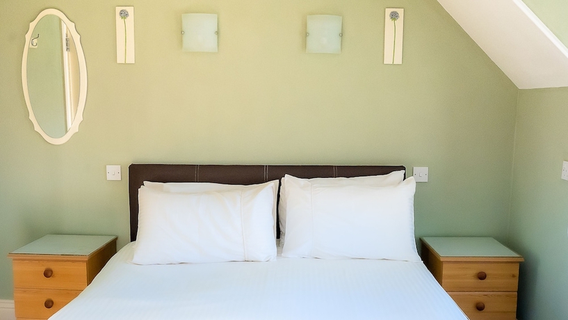 Imagen de la habitación del Hotel Crescent Lodge Guest House. Foto 2