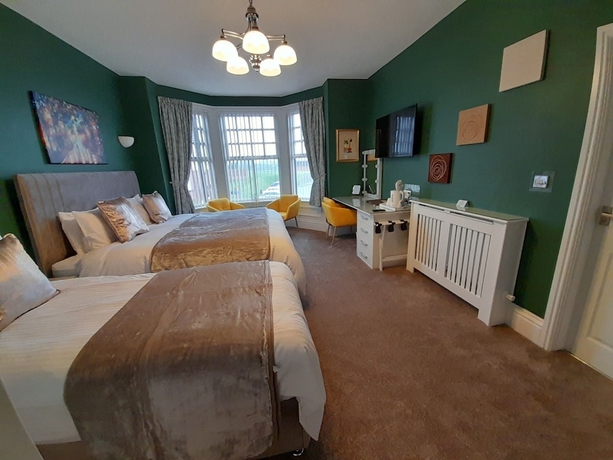Imagen de la habitación del Hotel Crescent Lodge Guest House. Foto 4