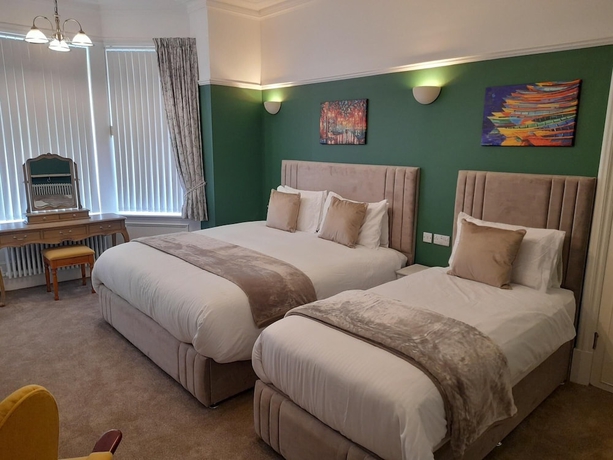 Imagen de la habitación del Hotel Crescent Lodge Guest House. Foto 6