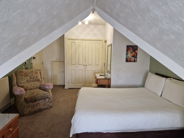 Imagen de la habitación del Hotel Crescent Lodge Guest House. Foto 9