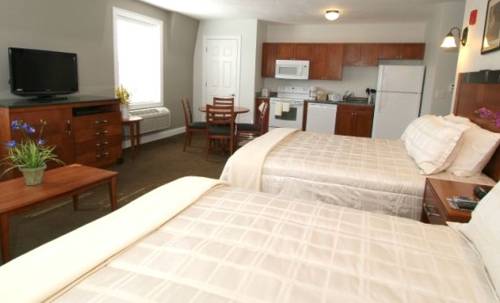 Imagen de la habitación del Hotel Crescent Suites. Foto 7